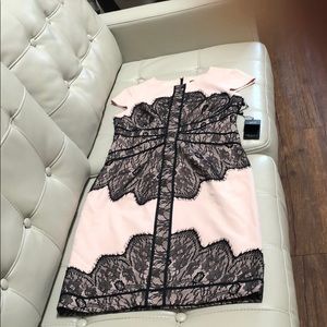 Cap sleeve contrast black lace light pink.